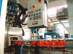 Moving parts on a filling machine can be hazardous without safe guards such as on/off push buttons.