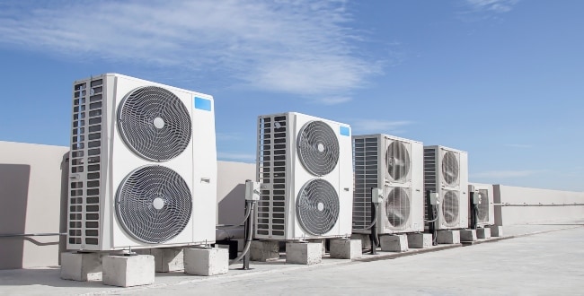 Transmitter Signals Precise Air Velocity Adjustments to Computer-Controlled Variable-Speed Fan Motor